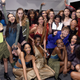 Models backstage at Chromat’s Fall 2017 show pose with designer Becca McCharen (center). Image via Getty.